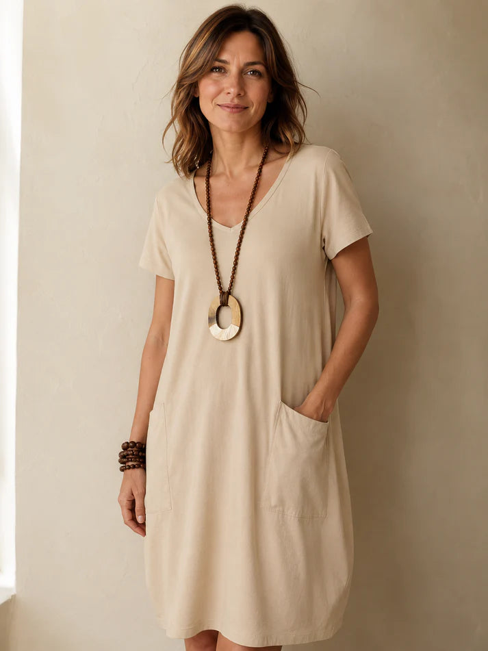 Vestido Sofia - Elegante vestido con una discreta cobertura del vientre.