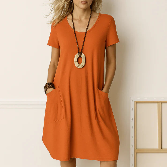 Vestido Sofia - Elegante vestido con una discreta cobertura del vientre.